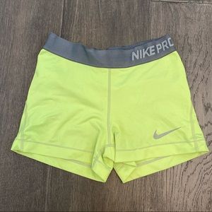 Neon yellow Nike Pro shorts